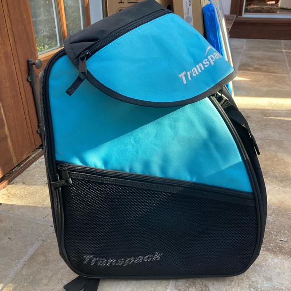 Transpac ski/snowboard boot helmet and gear backpack.